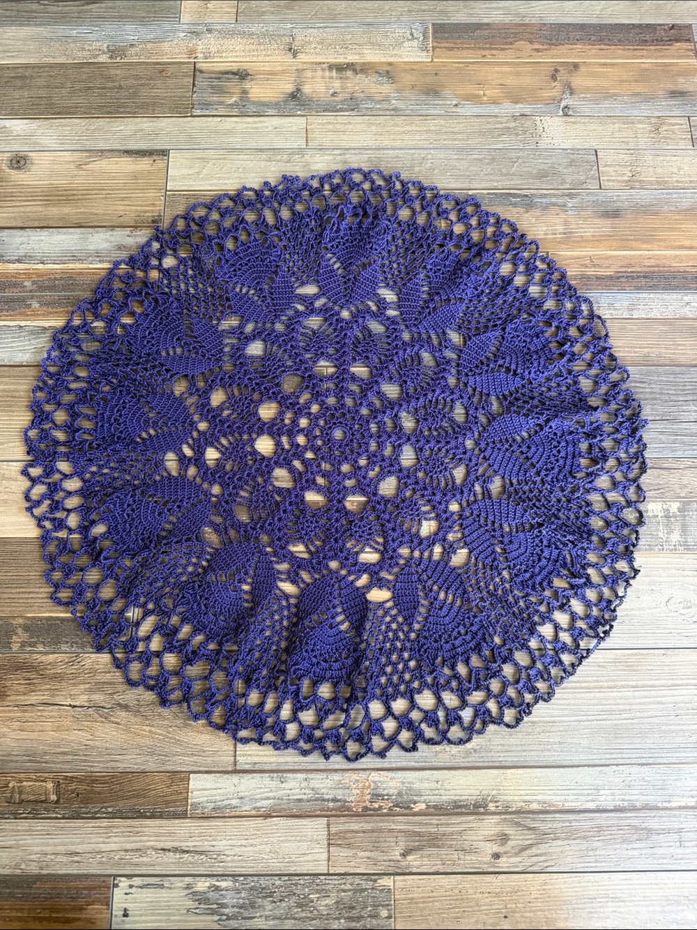 Vintage purple crochet doily with an intricate pineapple lace pattern Grannycore